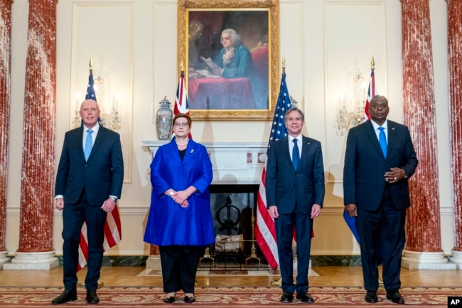 From left, Australian Minister of Defense Peter Dutton, Australian Foreign Minister Marise Payne, Secretary of State Antony Blinken, and Defense Secretary Lloyd Austin pose for a group photograph at the State Department in Washington, Thursday, Sept. 16,