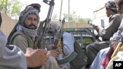 Local militias are recruited to provide security for Afghan districts with a shortage of police officers.