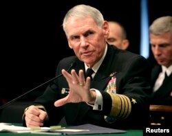 FILE - Navy Adm. William Fallon testifies before the Senate Armed Services Committee on Capitol Hill in Washington during a hearing on his nomination to be commander of the US Centeral Command Jan. 30, 2007.