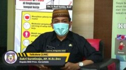 Zukri Surotinojo, Kepala BKD Provinsi Gorontalo ingatkan pentingnya penerapanan protokol kesehatan di perkantoran. (Foto: VOA/Yoanes Litha)