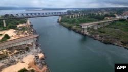 This handout picture released by the Maranhao State Communication Department shows the Juscelino Kubitschek de Oliveira bridge that collapsed on Dec. 22, 2024, over the Tocantins River in Aguiarnopolis, Tocantins State, Brazil.