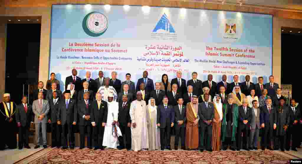 Leaders of nations taking part in the Organization of Islamic Cooperation's two-day summit, which brings together leaders from across the Muslim world, pose for a group photograph in Cairo, February 6, 2013.