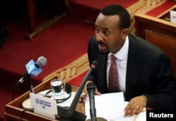 FILE - Ethiopia's Prime Minister Abiy Ahmed addresses the members of parliament inside the House of Peoples' Representatives in Addis Ababa, Ethiopia, April 19, 2018.