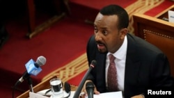 FILE - Ethiopia's Prime Minister Abiy Ahmed addresses the members of parliament inside the House of Peoples' Representatives in Addis Ababa, Ethiopia, April 19, 2018. 