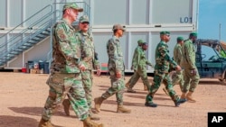 U.S. and Niger military personnel visit a base in Agadez, Niger, Aug. 5, 2024. The U.S. handed over its last military base in Niger to local authorities, the U.S. Department of Defense and Niger's Ministry of Defense announced in a joint statement on Monday. 