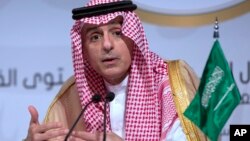 FILE - Saudi Arabia's Foreign Minister Adel al-Jubeir speaks during a press conference at the end of the Arab summit in Dhahran, Saudi Arabia, April 15, 2018.