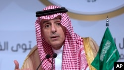 FILE - Saudi Arabia's Foreign Minister Adel al-Jubeir speaks during a press conference at the end of the Arab summit in Dhahran, April 15, 2018.