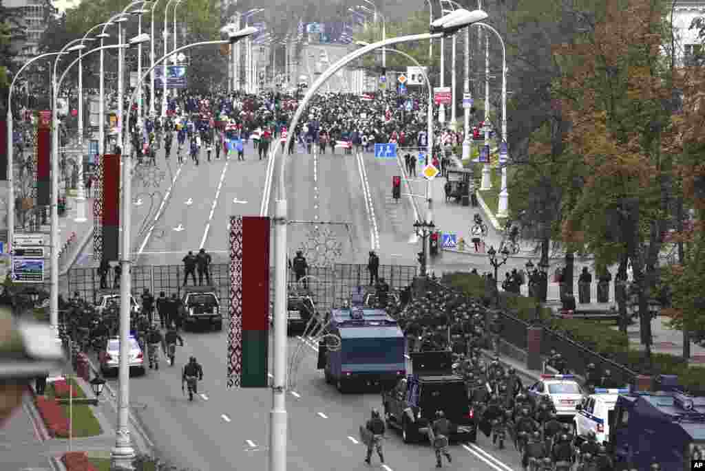 Belarusian police block a street during an opposition rally to protest the official presidential election results in Minsk.
