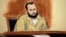 FILE - In this artist's drawing, Ahmad Khan Rahimi appears in a New York courtroom to face federal terrorism charges, Nov. 10, 2016. The Afghanistan-born U.S. citizen faces additional charges, filed Wednesday, November 16, 2016, for detonat