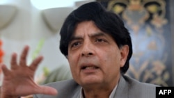 Pakistani Interior Minister Chaudhry Nisar Ali Khan speaks during a press conference in Islamabad, Feb. 20, 2014.