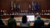 FILE - Delegates meet for a round of peace talks between Colombia's government and the National Liberation Army in Mexico City, Mexico, on Dec. 17, 2023. The government announced on Jan. 17, 2025, that it was suspending peace negotiations after violence that killed 30 people.