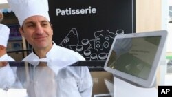 The Google Assistant, which includes an "interpreter mode" that enables some of Google's smart home devices to work as a translator, is seen at the Google display area at CES International in Las Vegas, Jan. 8, 2019.