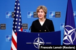 BELGIUM -- U.S. Ambassador to NATO Kay Bailey Hutchison briefs the media ahead of a NATO defence ministers meeting at the Alliance headquarters in Brussels, October 2, 2018