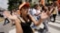 Opposition supporters take part in a rally to demand a referendum to remove Venezuela's President Nicolas Maduro, in Caracas, Venezuela, Sept.16, 2016. 