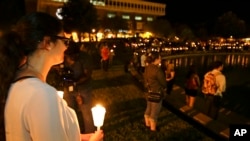 Students and supporters take part in a candlelight vigil at the University of Central Florida, Sept. 3, 2014, in Orlando, Florida, to honor Steven Sotloff, an American journalist beheaded by Islamic State militants. 