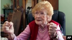 FILE - Guadalupe Portillo, who is 102, speaks during an interview in her Los Angeles home.