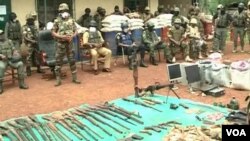 Cameroon military displaying weapons seized from separatists in Bamenda, March 4, 2021. (Moki Edwin Kindzeka/VOA)