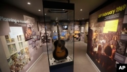 U.S. musician Jimi Hendrix's Epiphone acoustic guitar is displayed in an exhibition space at the central London flat he used to live in at 23 Brook Street, London, Feb. 8, 2016.