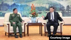 တရုတ်သမ္မတ နဲ့ မြန်မာကာကွယ်ရေး ဦးစီးချုပ်တို့ ဘေဂျင်းမြို့တော် ဆွေးနွေးပွဲ။ ဓာတ်ပုံ- CNTV