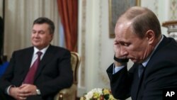 Виктор Янукович и Владимир Путин на встрече в Ново-Огарево, Подмосковье. Россия, 22 октября 2012 года