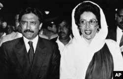 Pakistani Prime Minister Benazir Bhutto with her husband Asif Zardari during dinner party at the state guest house in Islamabad, April 19, 1990.