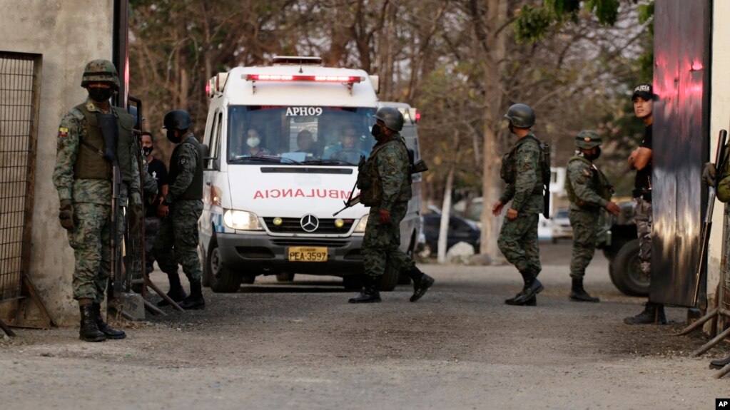 An ambulance leaves the Litoral Penitentiary after a prison riot, in Guayaquil, Ecuador, Wednesday, September 29, 2021. (AP Photo/Angel DeJesus)