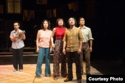 A scene from 'Cambodian Rock Band' when Chum, Sothea, Pou, Rom, and Leng, listen to a broadcast of the Khmer Rouge was taking over the country, Cambodia, in April 17, 1975. ( Photo by Jenny Graham, Oregon Shakespeare Festival)