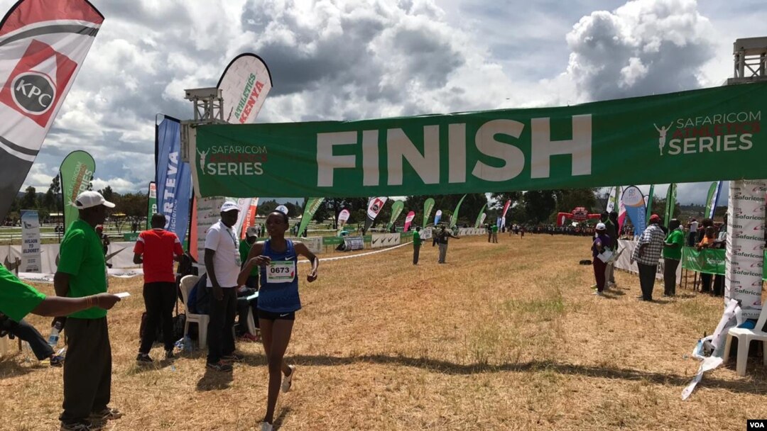 An athlete finishes the Ndalat cross country championship race. Some athletes have come to compete after years of training on their own. (M. Yusuf/VOA)