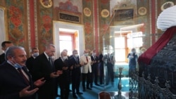 Turkish President Recep Tayyip Erdogan prays near the shrine of Sultan Mehmet II Fatih after the first Friday prayer during the official opening ceremony of Hagia Sophia as a mosque, July 24, 2020.