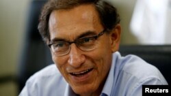 FILE - Peru's Vice President Martin Vizcarra talks during an interview with Reuters at his office in Lima, March 31, 2017.