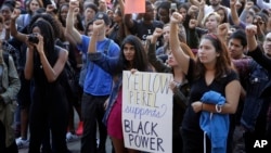 FILE - University California Los Angeles students stage a protest rally in a show of solidarity with protesters at the University of Missouri, Thursday, Nov. 12, 2015 in Los Angeles.