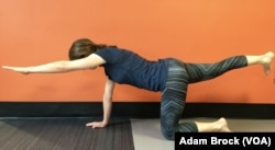 This exercise, called the Quadruped, targets your core.
