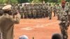 Deux femmes circulant en charrette et deux soldats tués par des mines