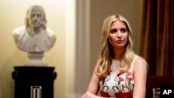 FILE - Ivanka Trump, the daughter of President Donald Trump, attends a meeting with President Donald Trump in the Cabinet Room of the White House, July 17, 2018, in Washington. 