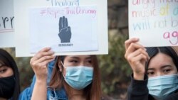 A group of Thai students holds up placards during a demonstration, anti-Thai government protest in front of the Royal Thai Embassy in Washington, DC. Tuesday, Oct 20, 2020