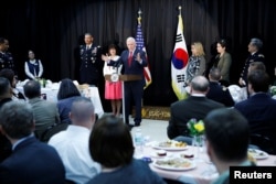 U.S. Vice President Mike Pence speaks during an Easter fellowship dinner at a military base in Seoul, South Korea, April 16, 2017.