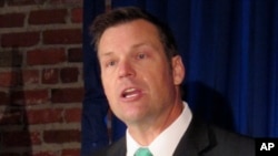 FILE - Then-Kansas Secretary of State Kris Kobach is pictured in Lenexa, Kan., June 8, 2017. Kobach has advised President Donald Trump on immigration and election fraud issues and is vice chairman of a presidential commission on voter fraud. 