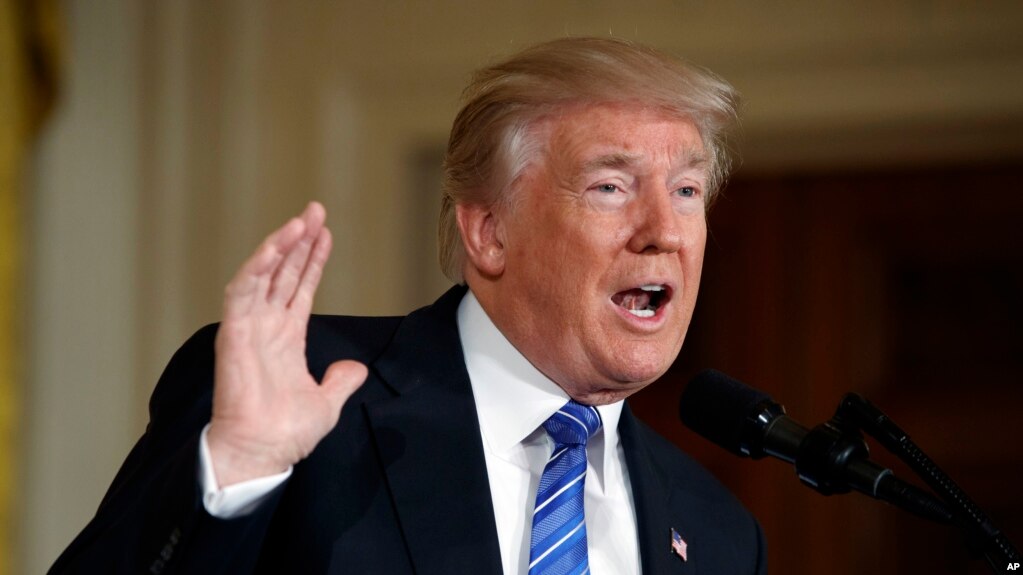 FILE - President Donald Trump speaks during a bill signing event for the "Department of Veterans Affairs Accountability and Whistleblower Protection Act of 2017" in the East Room of the White House.