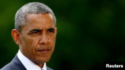 FILE- U.S. President Barack Obama speaks about the situation in Iraq from the South Lawn of the White House in Washington, June 13, 2014.