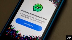 FILE - Facebook's Messenger Kids app is displayed on an iPhone in New York, Feb. 16, 2018. 