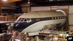 Only the front half of the de Havilland Comet - the first jet airliner in passenger service - fits into the restoration hanger.
