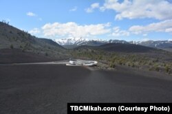 The view from the top of the Inferno Cone, a tall mound made of cinder, is of a surreal terrain that looks much like the surface of the moon.