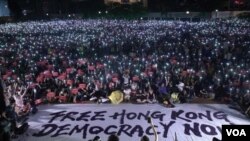 香港人参与民阵6月26日 "G20 香港自由"集会，希望国际社会向北京施压。 (美国之音汤惠芸摄)