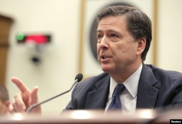FILE - FBI Director James Comey has warned that spreading encryption on smartphones was "harmful" to law enforcement.