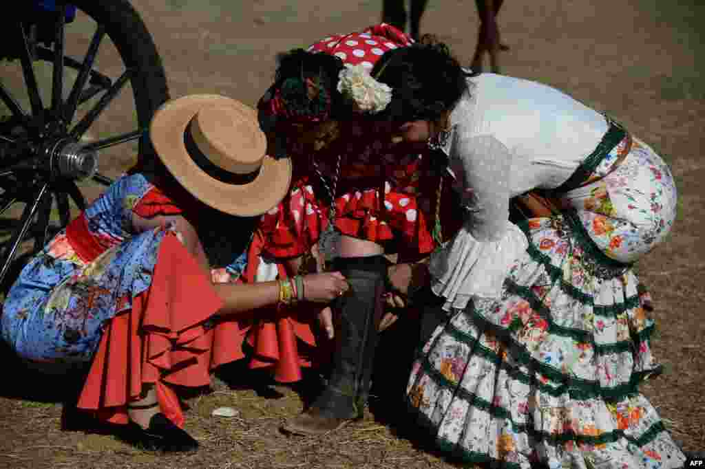 Pilgrims rest in Villamanrique, during a pilgrimage to the village of El Rocio, Spain.