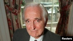 An April 9, 1997 photo of Doug Engelbart, inventor of the computer mouse and winner of the half-million dollar 1997 Lemelson-MIT prize, posing with the computer mouse he designed, in New York.