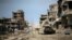 FILE - A general view of buildings ravaged by fighting in Sirte, Libya, Oct. 22, 2011, as the country's new leaders prepared to declare liberation after months of bloodshed that culminated in the death of longtime dictator Moammar Gadhafi. 