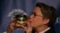 Actor Annette Bening kisses her Pudding Pot Award after a ceremony to honor her as Hasty Pudding Theatricals' Woman of the Year at Harvard University in Cambridge, Massachusetts, Feb. 6, 2024. 