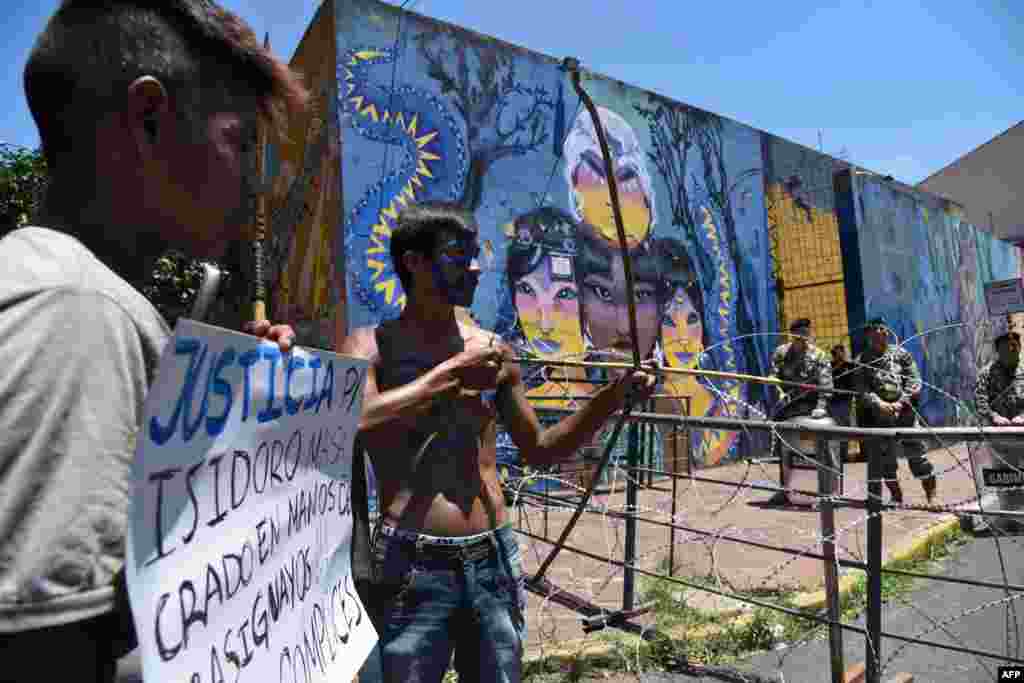 Indigenous people demonstrate in front of the presidential palace in Asuncion to demand the resignation of the president of the Indigenous Paraguayan Institute (Indi), Ana Maria Allen Davalos, saying they are constantly expelled by foreigners from their land.