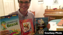 Philippe Sion displays his trading books from the last three World Cups. (Rachel Dornhelm)